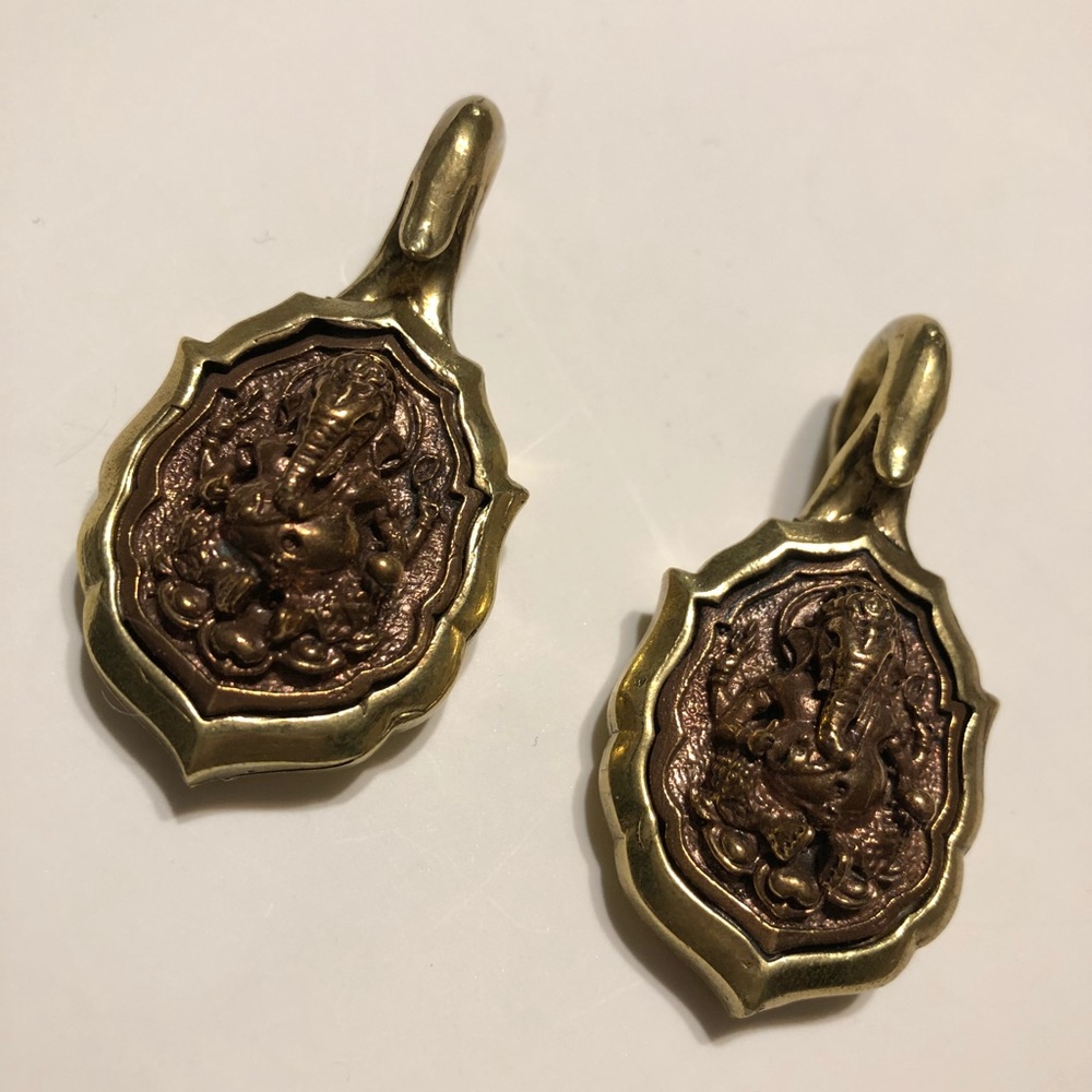 Carved brass ear weights